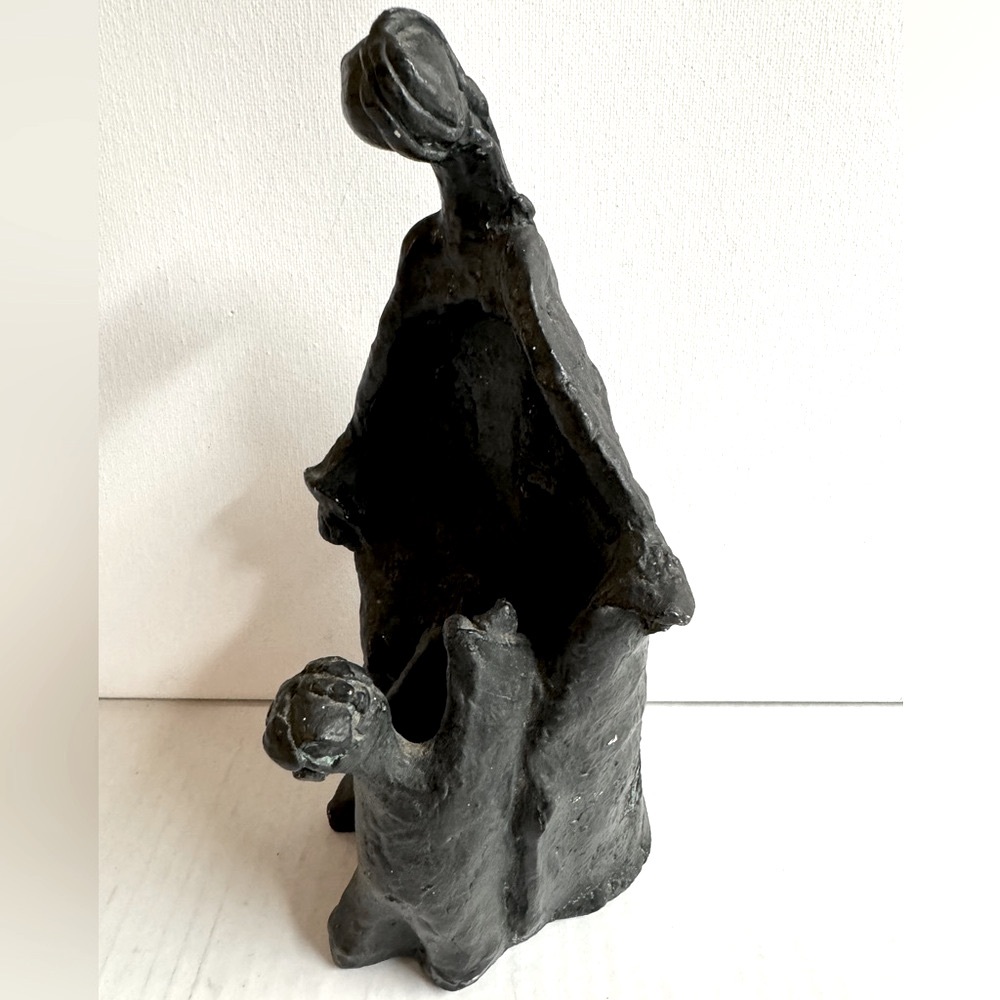 Vtg.1972 Signed Austin Production Brutalist
Mother and child sculpture in black.